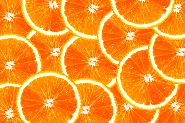 verse, sappige stukjes sinaasappel overlappen voor achtergrond