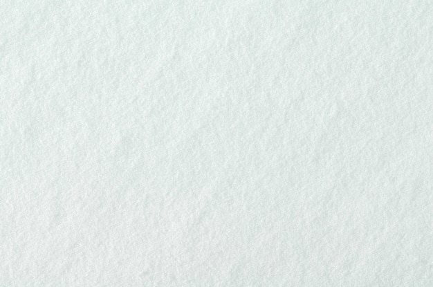 Foto verse sneeuwachtergrond witte kristallijne sneeuwtextuur