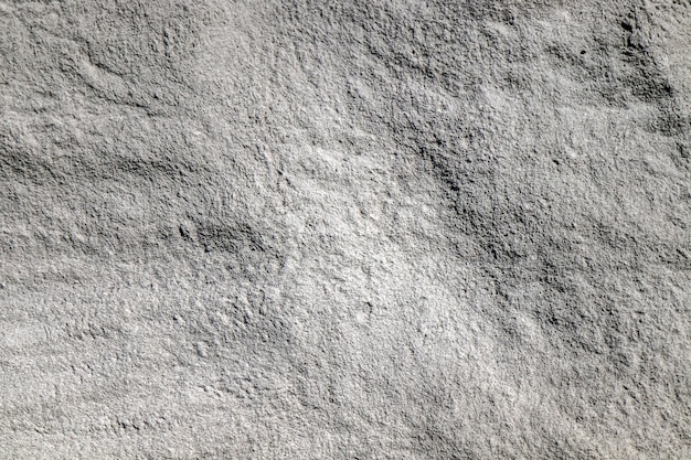 Verspreid bouwmateriaal cement als abstracte achtergrond