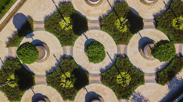 Vertical aerial top down view shot and looking down on the city park in Krasnodar, Russia