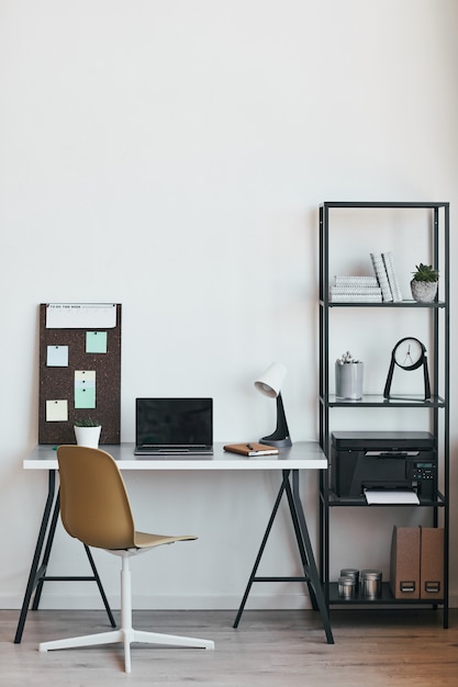 Vertical Background Image Of Minimal Home Office Workplace With Laptop And Accessories In Black And White, Copy Space