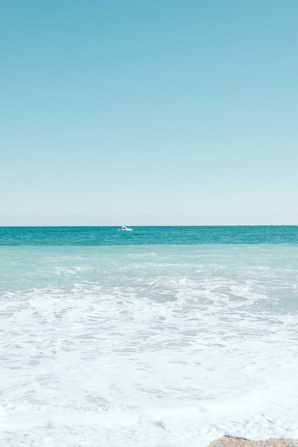 vertical empty turquoise mediterranean beach