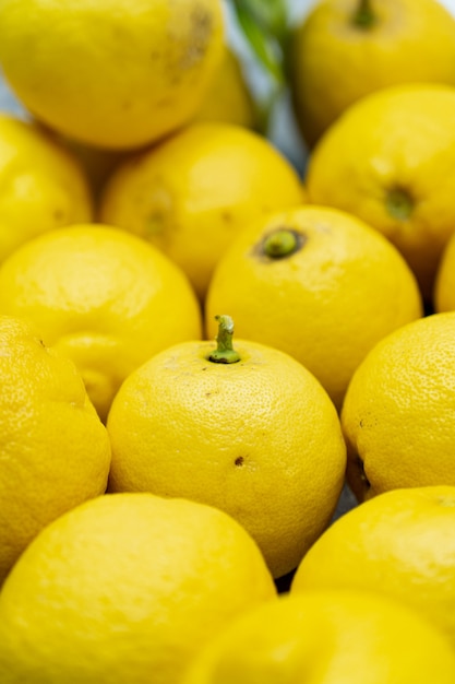 Vertical image of lemons with focus in the center