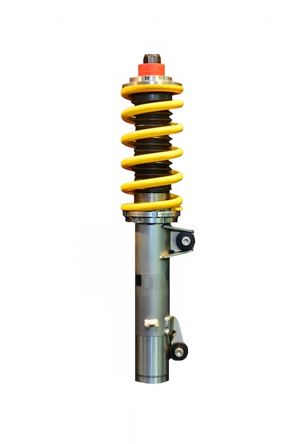 Photo vertical image of one yellow shock absorber isolated on white space