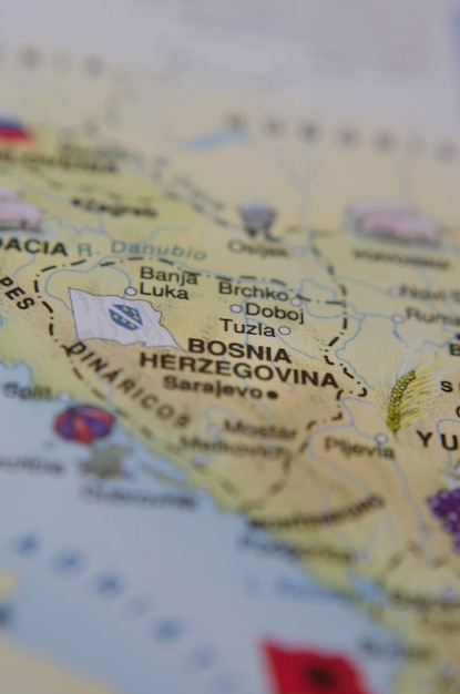 vertical map of bosnia with the flag of bosnia in travel concept