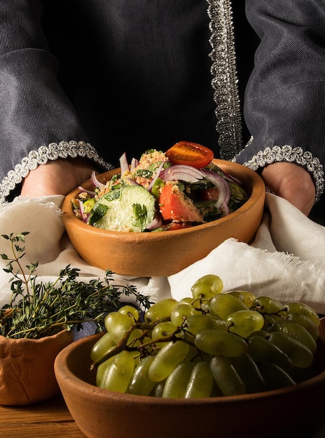 Vertical picture of a dish in hands