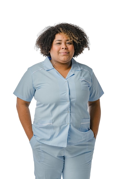 vertical portrait of AfroLatin female doctor standing and looking at camera on white background