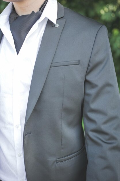 Photo vertical shot of a businessman with an elegant suit