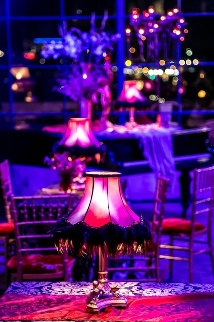 Vertical shot of an illuminated elegant dinner table