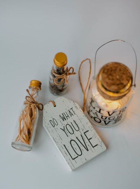 Vertical shot of a jar with the text live laugh love in a decoration set