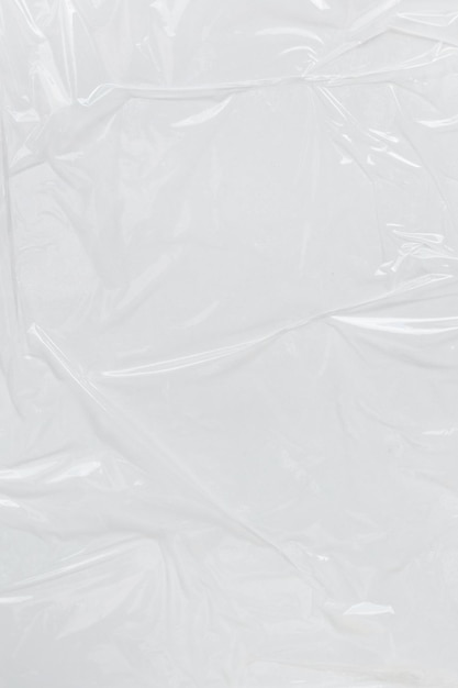 Photo vertical transparant wrinkled plastic white plastic or polyethylene bag texture macro white background