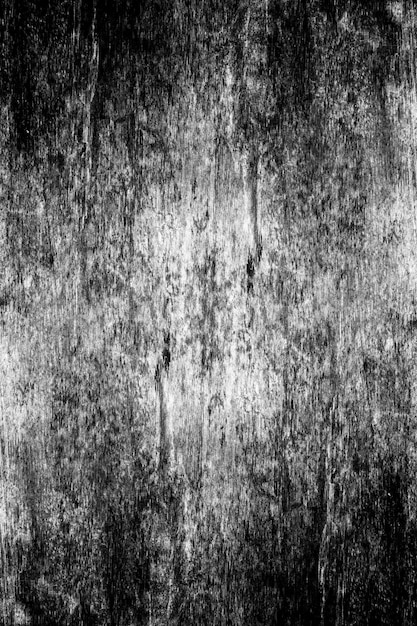 Vertical view of aged dark wooden board for background