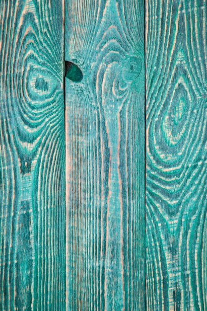 Verticale achtergrond van drie groene geweven planken.