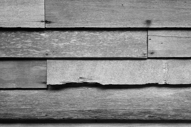 Foto verweerde grijze achtergrond met houten muurtextuur