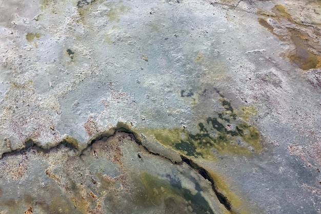 Verweerde grijze oude cement muur textuur close-up shot