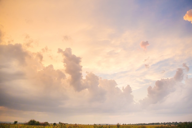 Very beautiful orange sunset sky with clouds