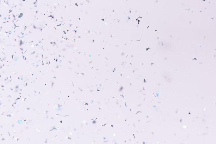 A very beautiful template for your blog, promotions and discounts. The silver colorful confetti flying in the sky in a celebration ceremony on a pastel pink background