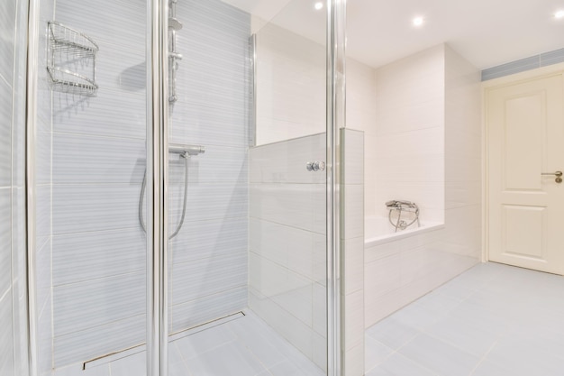 Very cozy bathroom with soft blue walls and floor