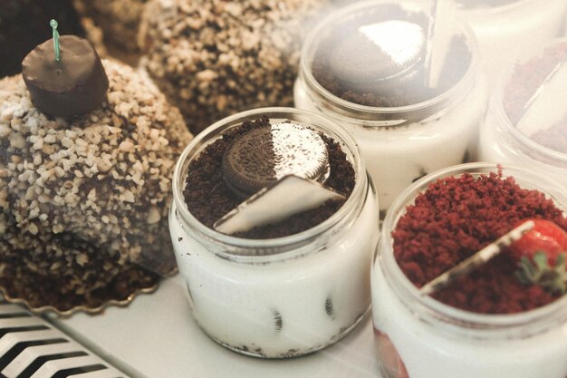 Very delicious dessert in jars, sweet and cakes in jars