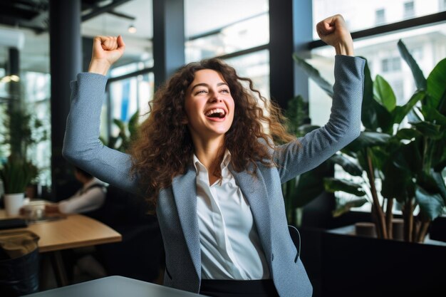 Very happy businesswoman rejoices at a successful project