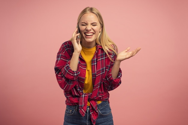 Very happy girl talk with a friend on the mobile phone