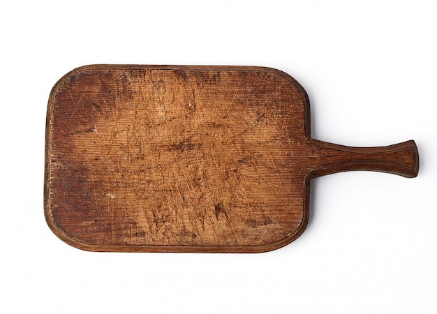 Very old vintage cutting board with a handle made of oak 