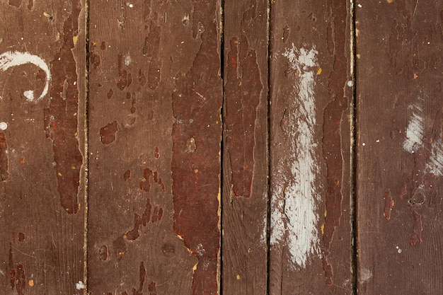 Very old wooden floor with holes and slivers