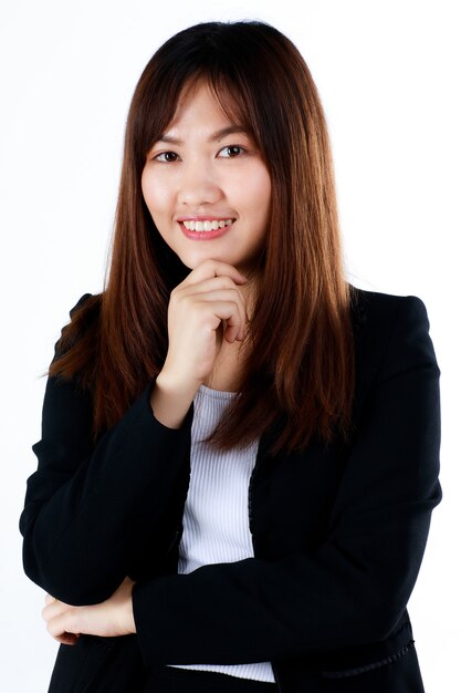 Very young teen businesswoman in formal black suit smile with cute and self-confident .