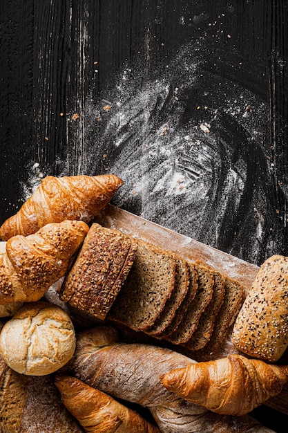 Vibrant and appetizing variety of baked goods created by the skilled hands of bakers Gorgeous bread rolls perfectly golden croissants fresh and fragrant baguettes are presented in all their glory