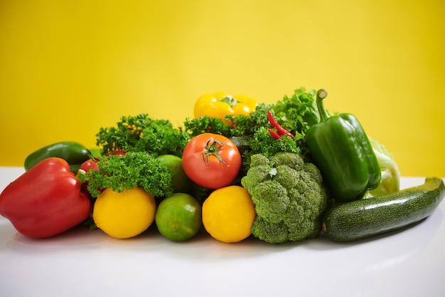 vibrant array of fresh vegetables on white surface