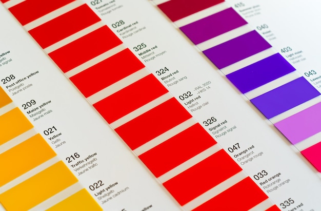 Vibrant colors swatches adhesive film with colour names in English German and French closeup detail