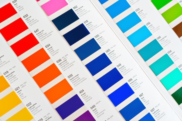 Vibrant colors swatches adhesive film with colour names in English German French Polish and Russian closeup detail