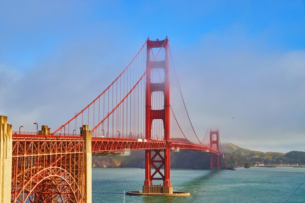 Vibrant and iconic Golden Gate Bridge on foggy morning