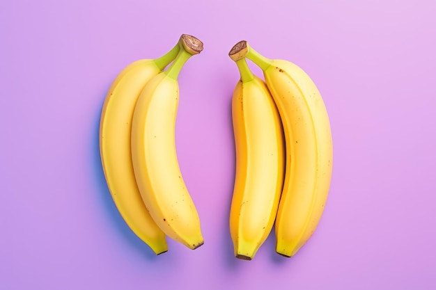 Vibrant topview composition yellow and blue bananas popping against pink background