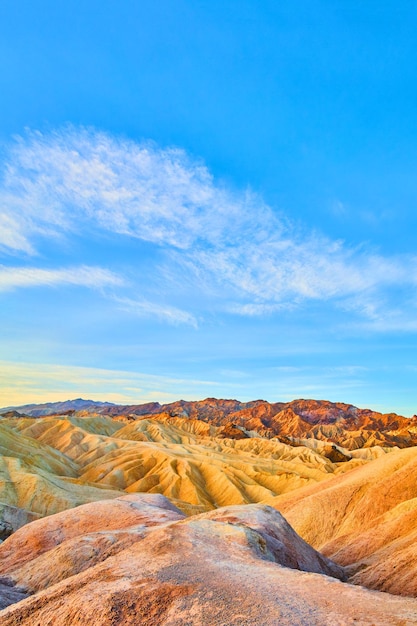 Vibrant waves of color at Death Valley through mountains