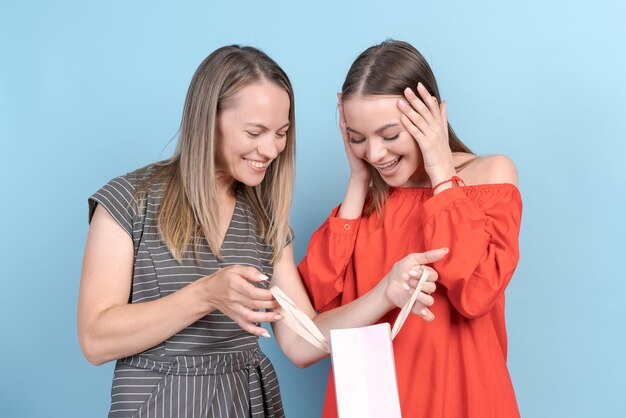 Vibrations family shopping Portrait happy mother and daughter with shopping