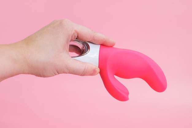 Vibrator in female hand sex toys concept