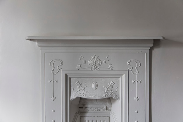 Photo victoriran cast iron fireplace surround with white walls