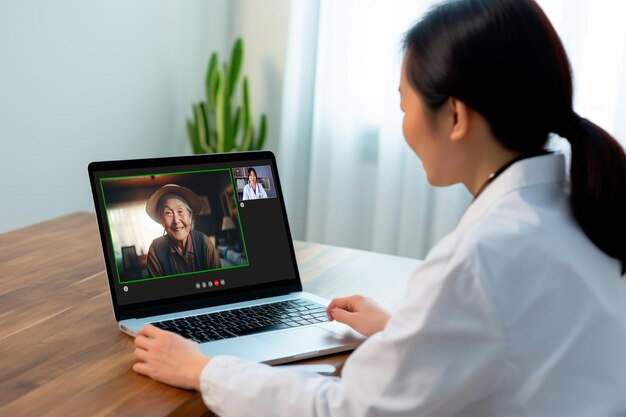 Photo video call between an asian old patient and a female asiatic doctor