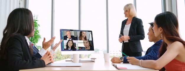 Photo video call group business people meeting on virtual workplace or remote office