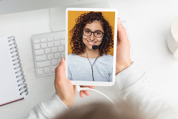 Video call with a girl on the screen. Online conference. Educational webinar.