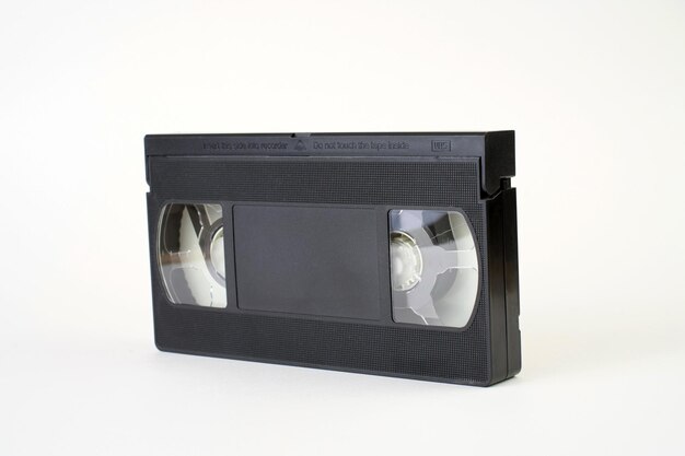 Photo video cassette tape on white background closeup