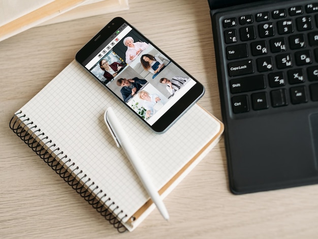 Video chat mobile meeting coworkers on smartphone