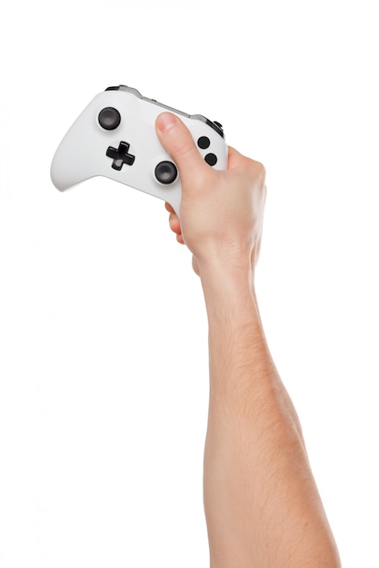 Photo video game console controller in gamer hands isolated