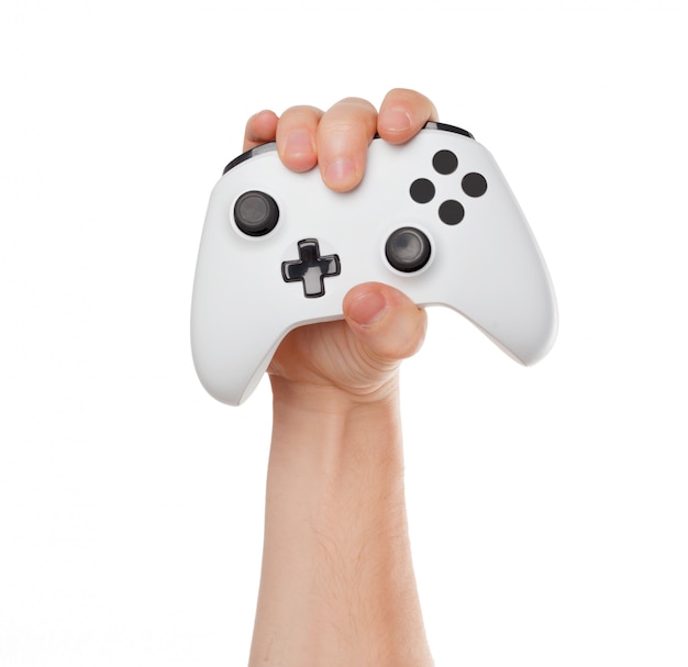 Video game console controller in gamer hands isolated