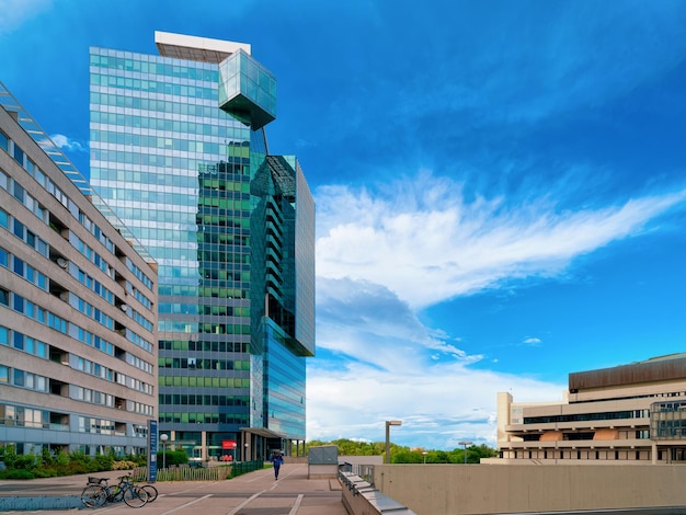 Vienna, Austria - May 20, 2019: Glass Business office buildings architecture of Modern City in Vienna of Austria. Urban corporate skyscraper exterior and skyline. Finance commercial center