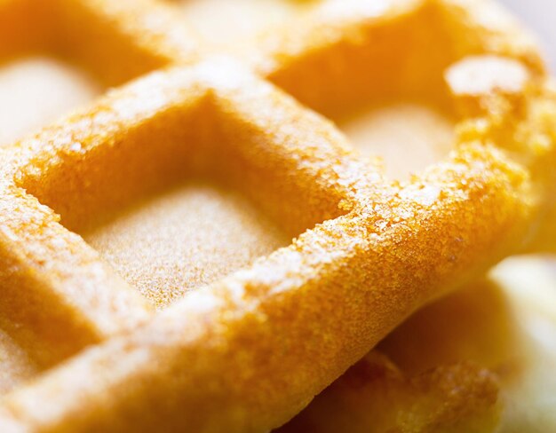 Viennese waffles close-up large cage and baking texture - culinary background