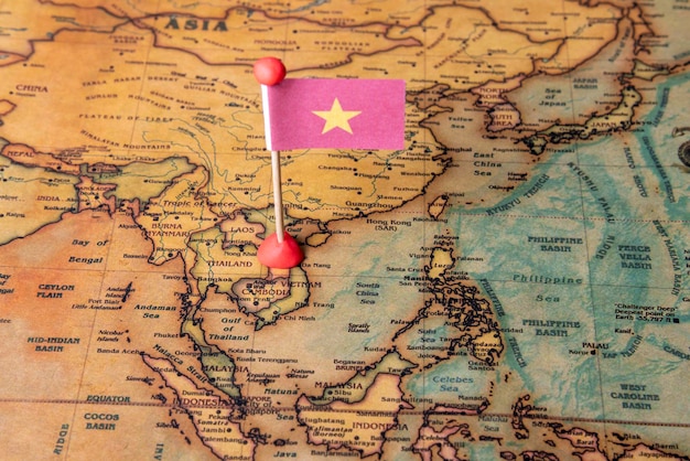 Vietnam flag and plane on the world map