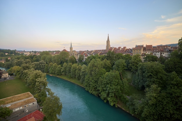 View of the Aar river at sunset as it passes through the city of Bern Switzerland