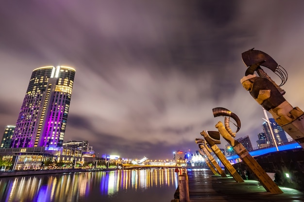A view across the Yarra river at the landmark of Melbourne downtown during the city’s ni